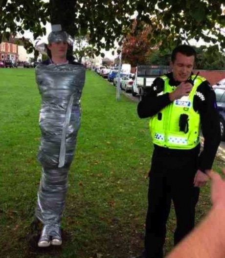 Drunken Student taped to Tree